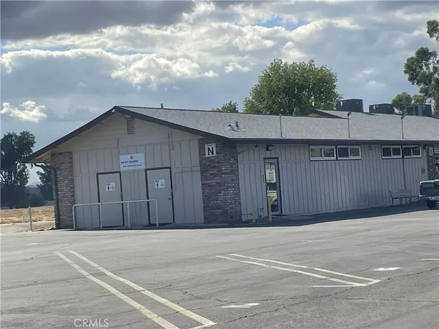 a view of a garden with a pathway