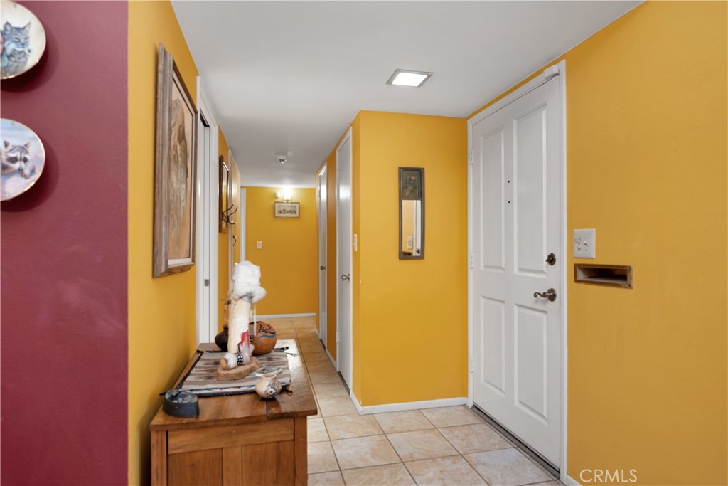 28839 Carmel Road Menifee, CA 92586 - Photo 8 of 47 a bathroom with a sink a mirror and a shower