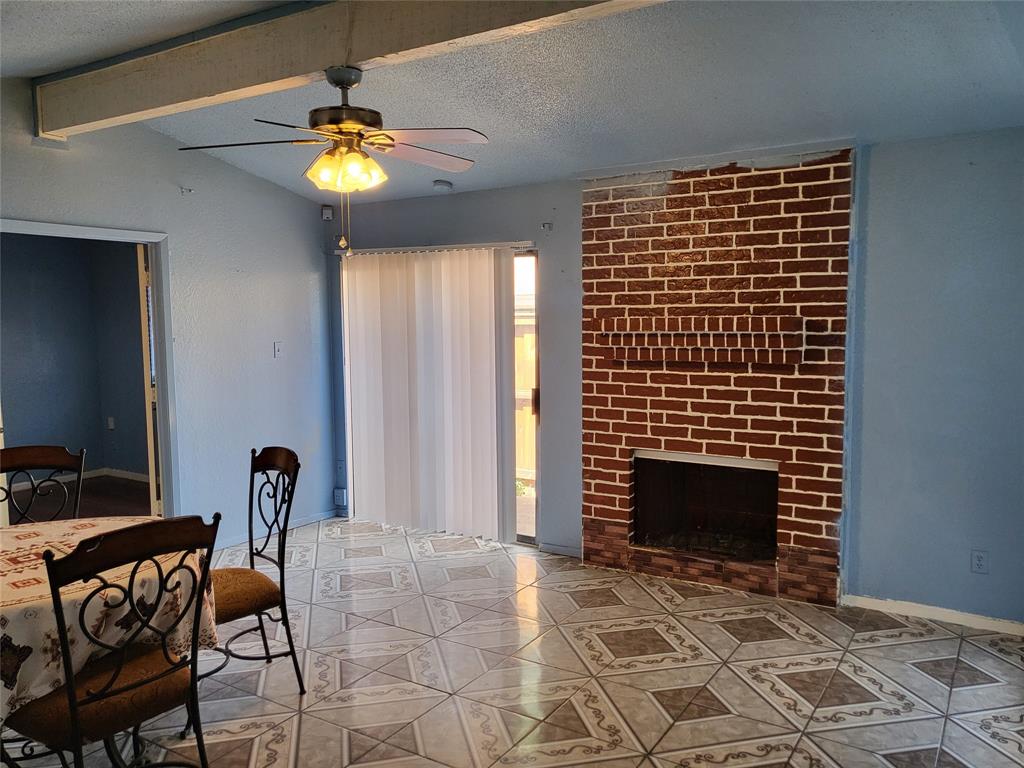3320 Green Ridge Street Fort Worth, TX 76133 - Photo 5 of 24 With fireplace and sliding door.