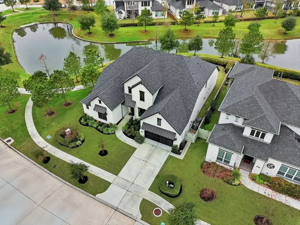 an aerial view of a house having outdoor space swimming pool