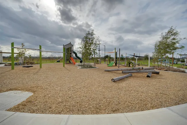 a view of a park with swings