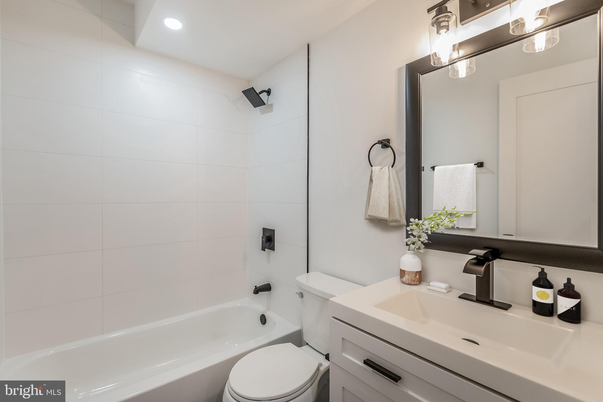 2228 13th Street Northwest, Unit 1 Washington, DC 20009 - Photo 8 of 14 Virtually Staged - Main Bathroom