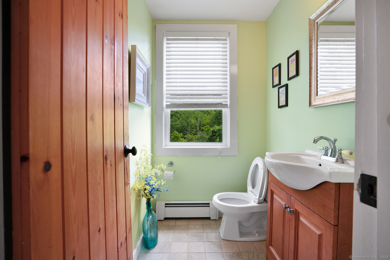 2 Valley Road Washington, CT 06777 - Photo 17 of 32 a bathroom with a sink a toilet and a mirror