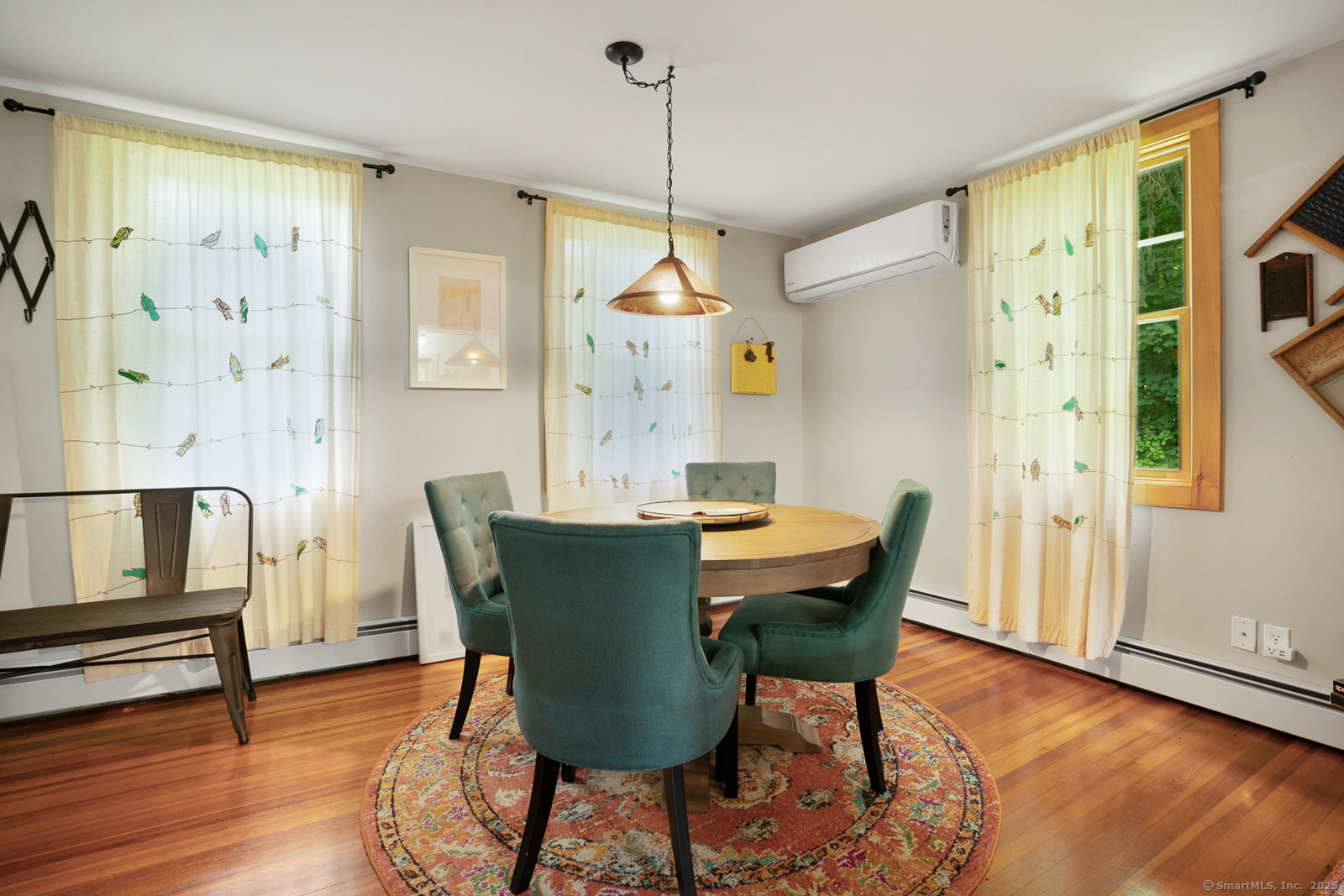 2 Valley Road Washington, CT 06777 - Photo 19 of 32 a view of a dining room with furniture window and wooden floor