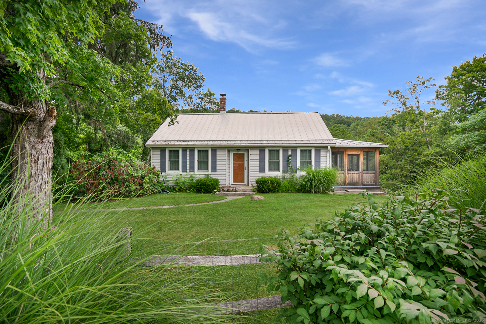 2 Valley Road Washington, CT 06777 - Photo 5 of 32 a front view of a house with a yard