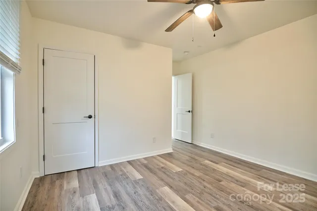 a bathroom with a toilet sink and shower
