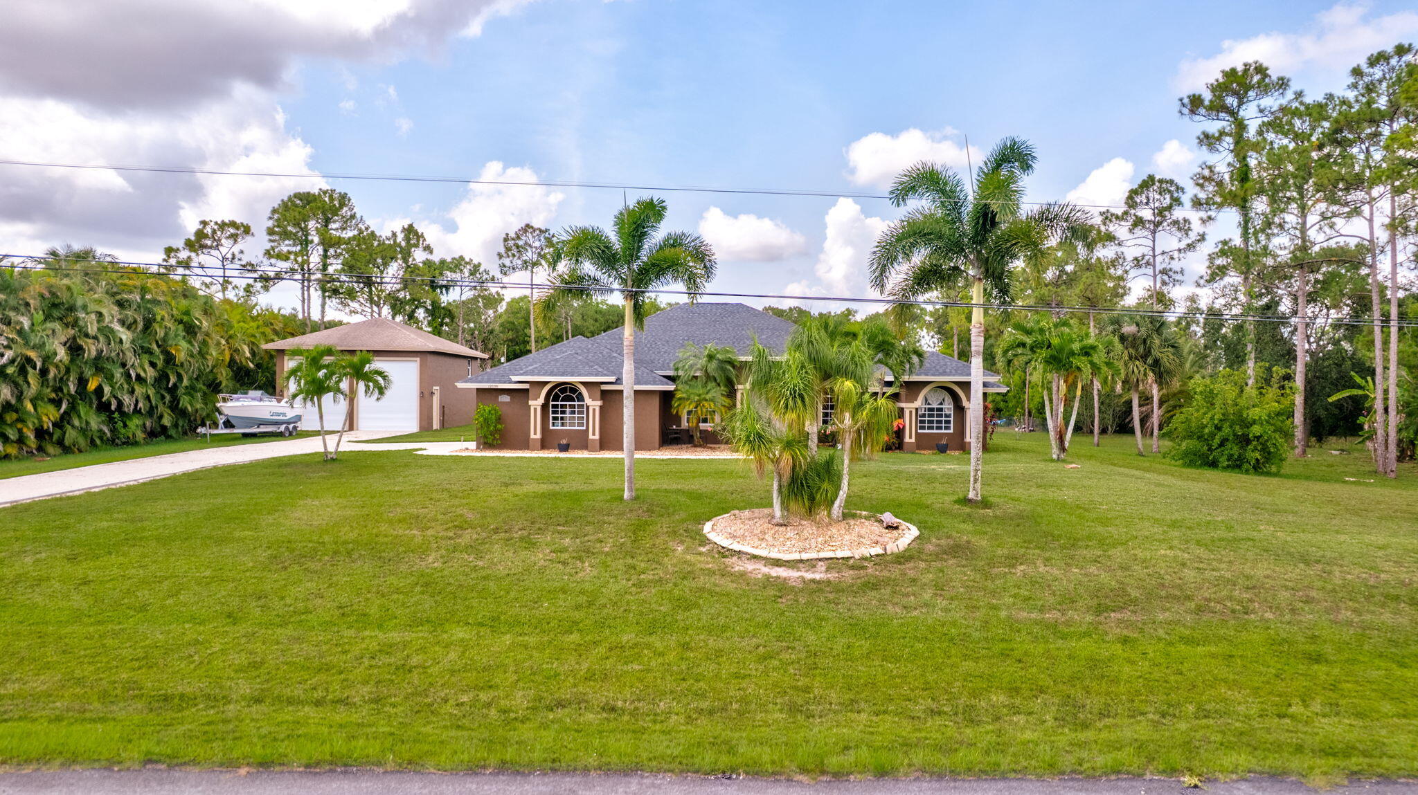 12098 86th Road North The Acreage, FL 33412 - Photo 2 of 40 61-web-or-mls-DJI_0006AA