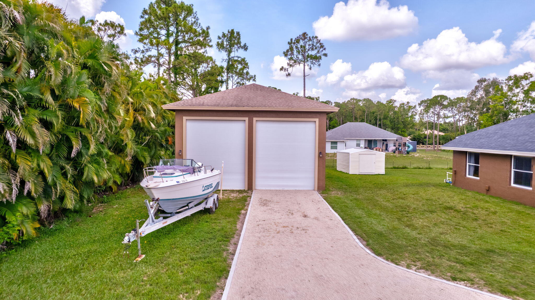 12098 86th Road North The Acreage, FL 33412 - Photo 35 of 40 78-web-or-mls-DJI_0096AA