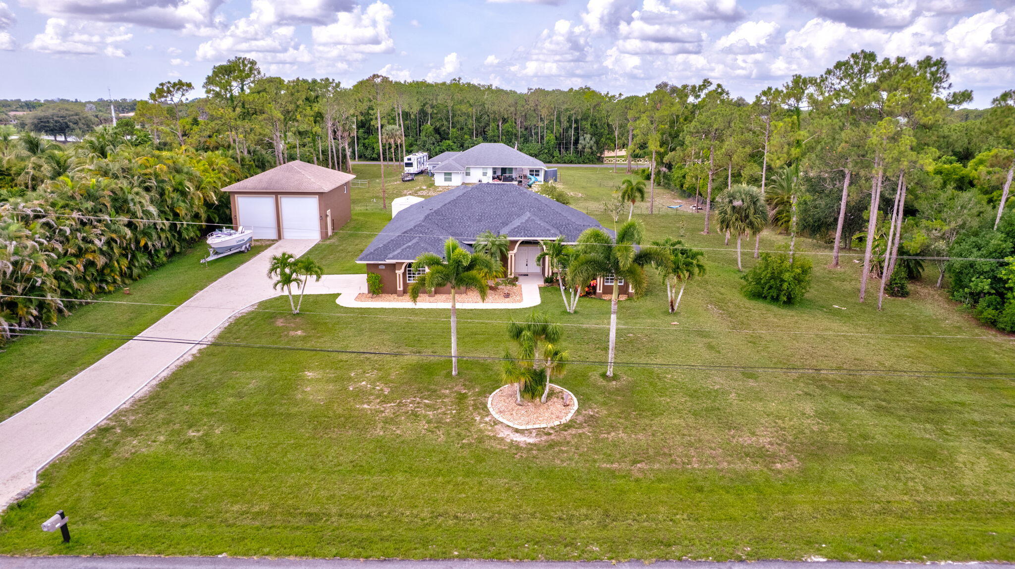 12098 86th Road North The Acreage, FL 33412 - Photo 38 of 40 69-web-or-mls-DJI_0021AA