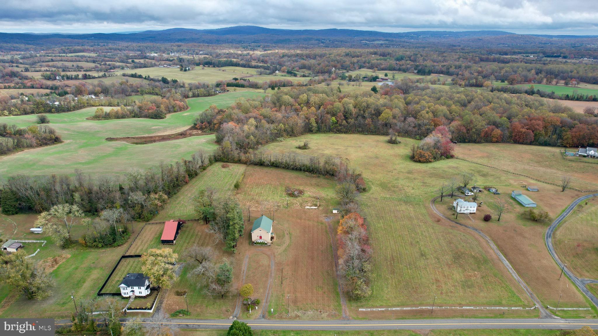 7035 Leeds Manor Road Marshall, VA 20115 - Photo 3 of 17 an aerial view of a house with a yard