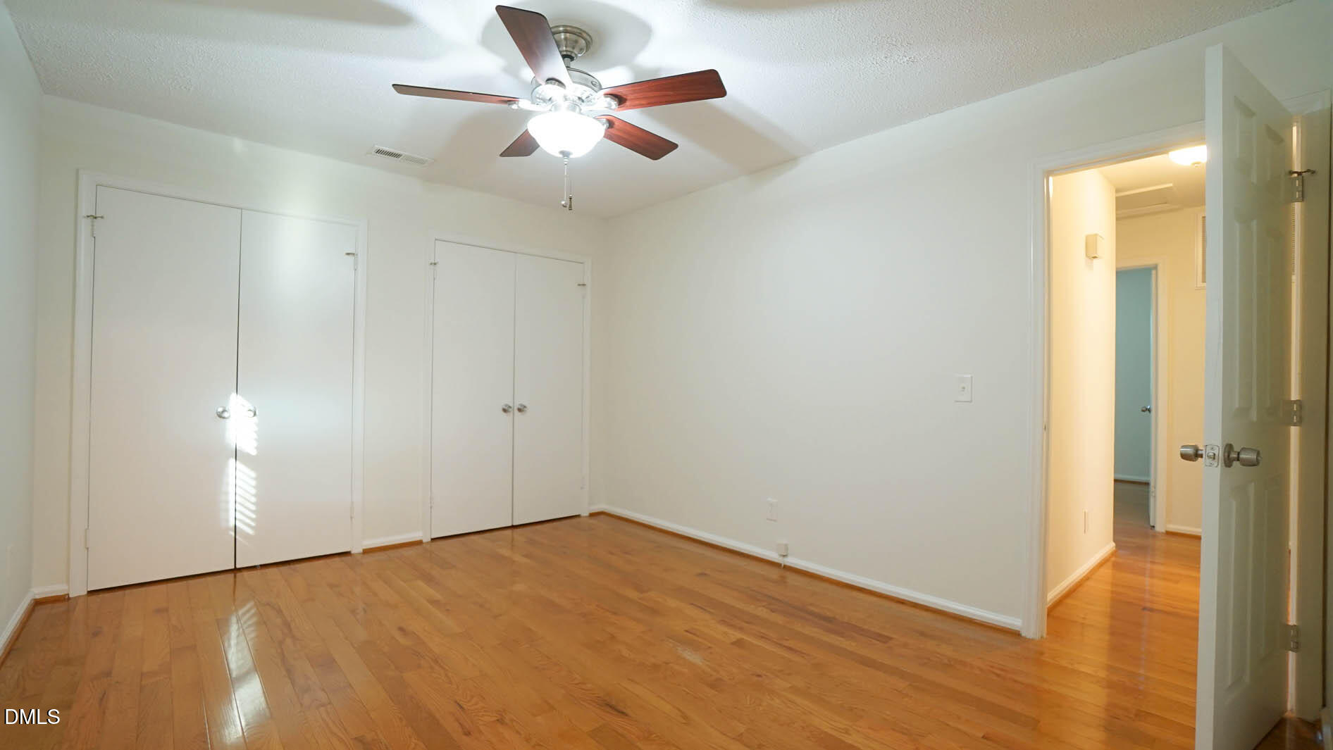 812 Havenwood Court Raleigh, NC 27615 - Photo 15 of 32 wooden floor in an empty room
