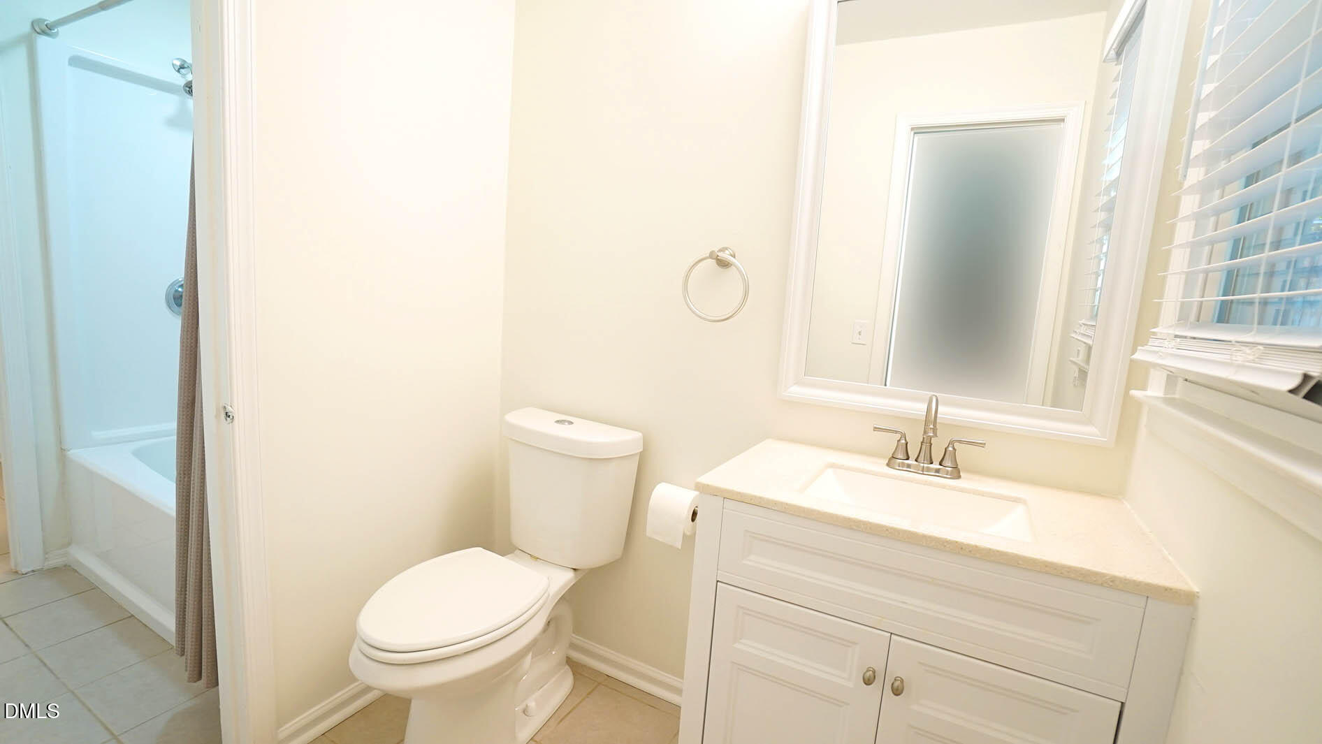812 Havenwood Court Raleigh, NC 27615 - Photo 21 of 32 a bathroom with a sink toilet and mirror