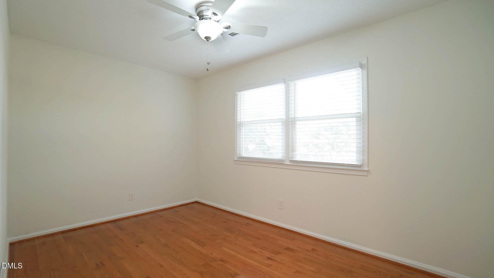 812 Havenwood Court Raleigh, NC 27615 - Photo 22 of 32 an empty room with a window