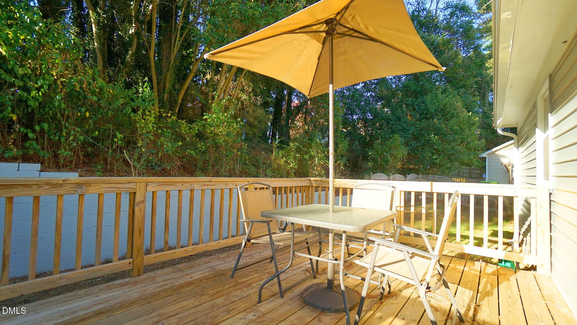 812 Havenwood Court Raleigh, NC 27615 - Photo 27 of 32 a view of balcony with wooden floor and outdoor seating