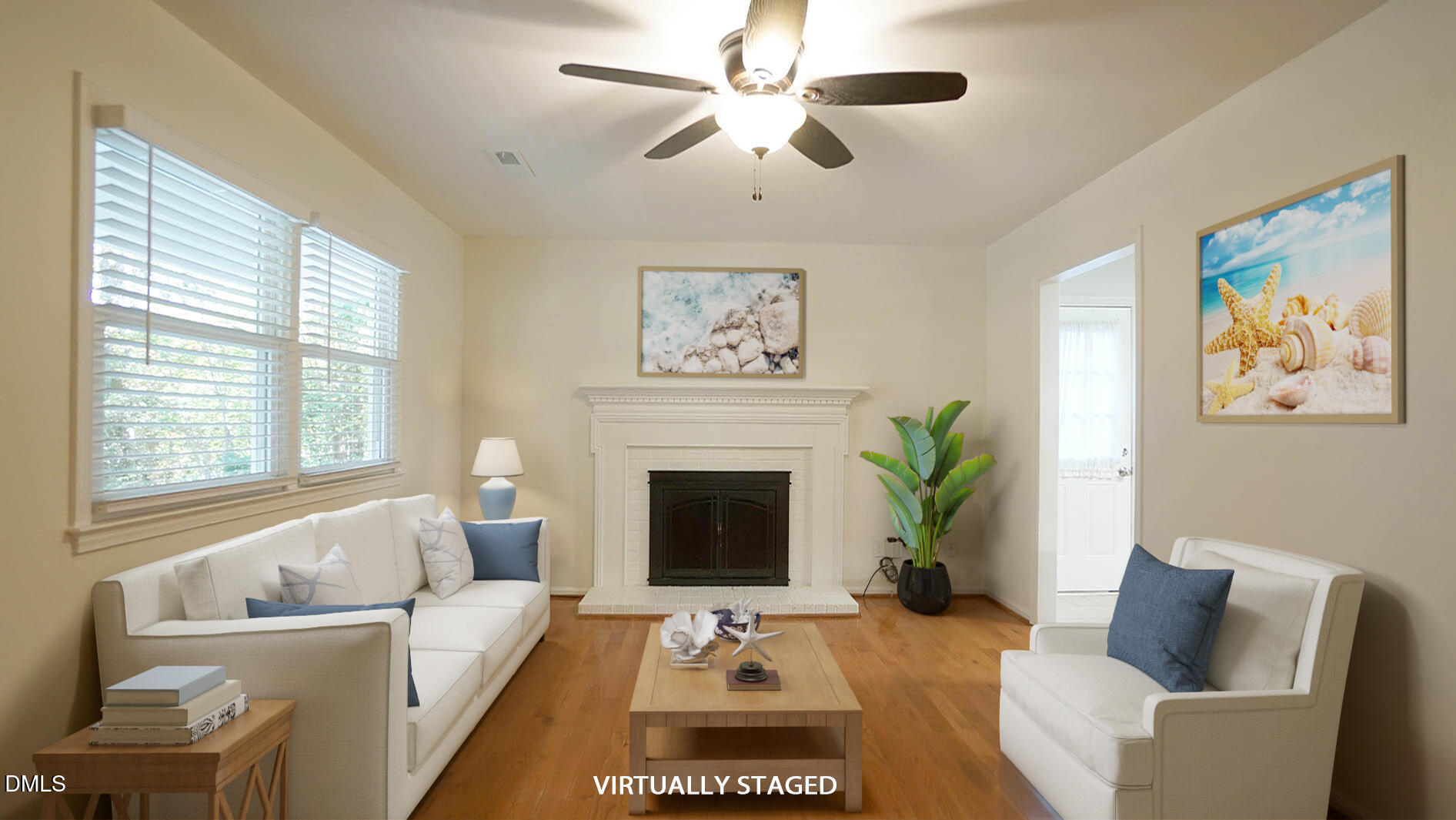 812 Havenwood Court Raleigh, NC 27615 - Photo 3 of 32 a living room with furniture a window and a fireplace
