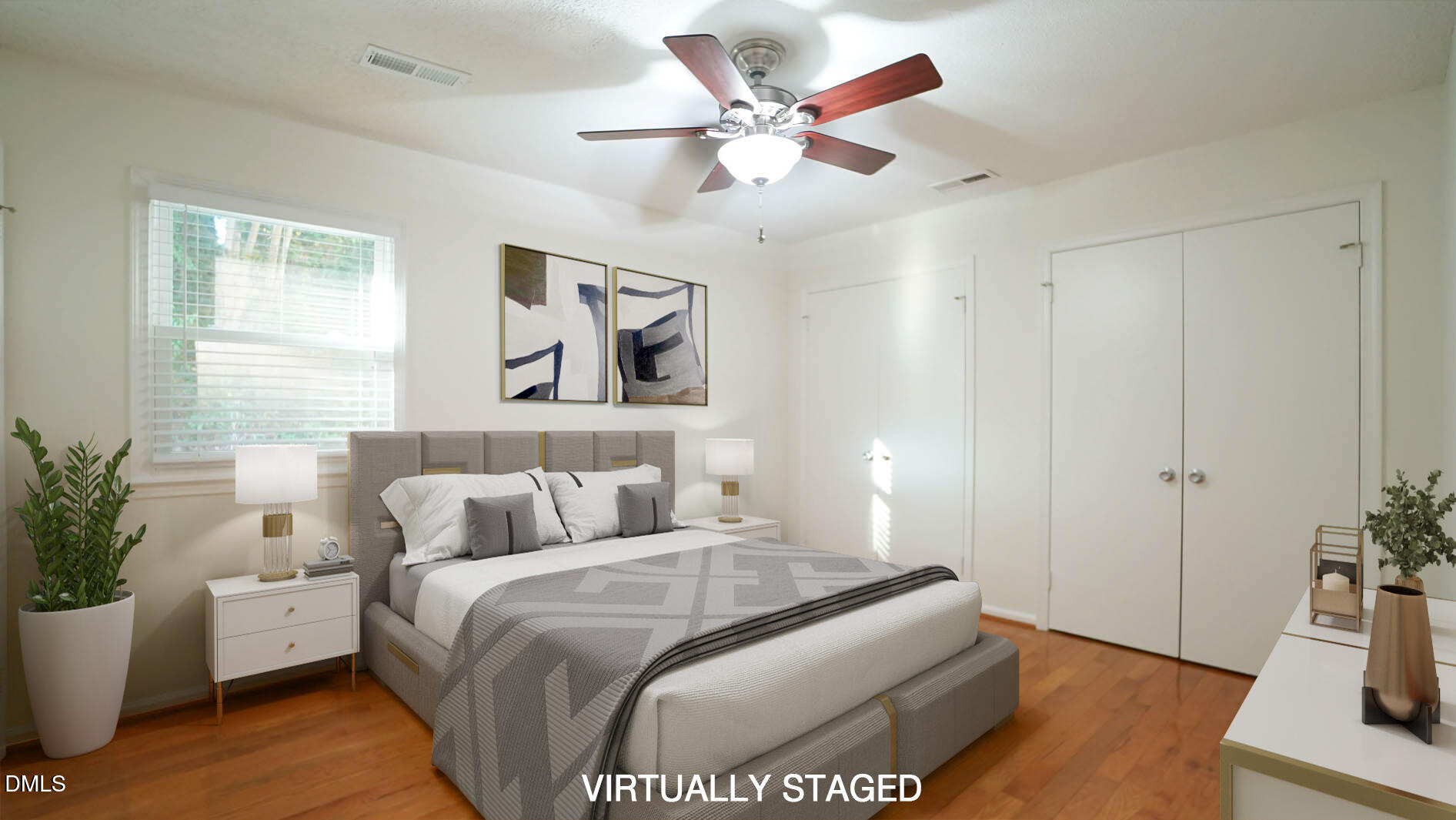 812 Havenwood Court Raleigh, NC 27615 - Photo 5 of 32 a bedroom with a bed and a potted plant