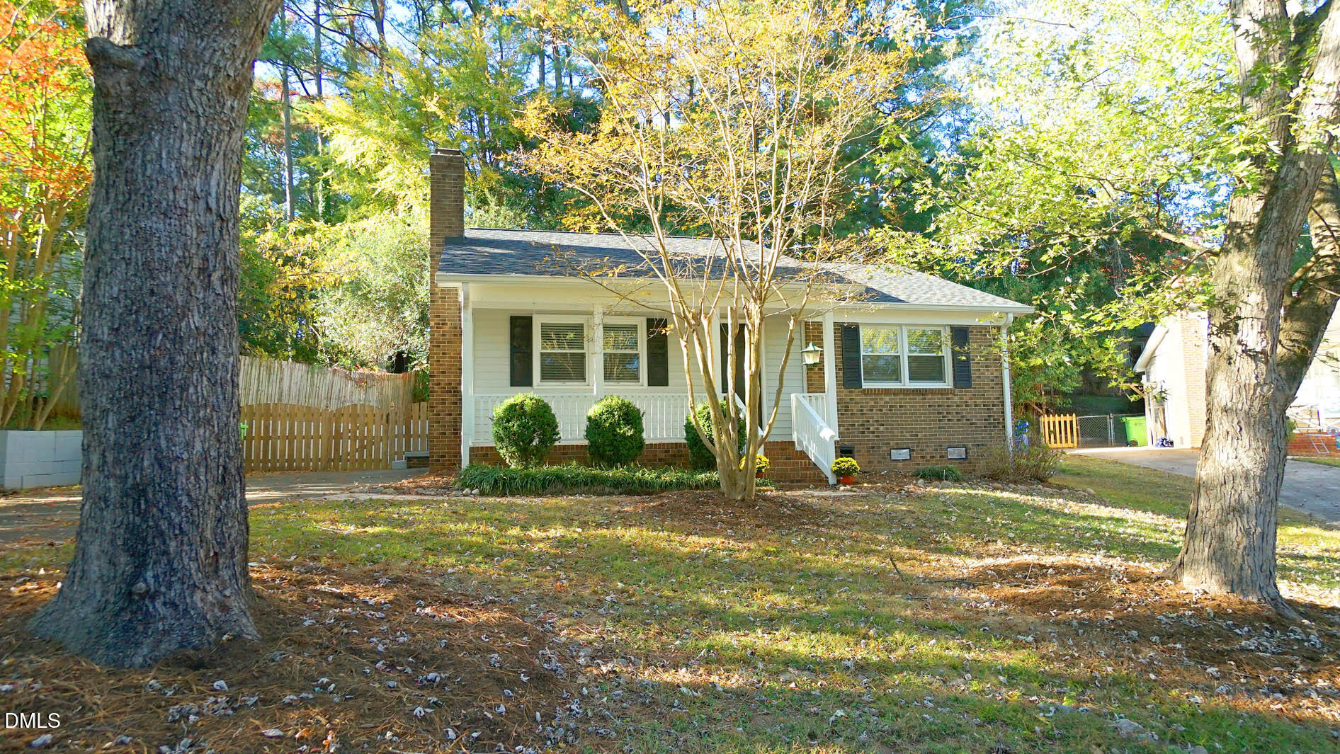 812 Havenwood Court Raleigh, NC 27615 - Photo 9 of 32 a view of a house with backyard and a tree