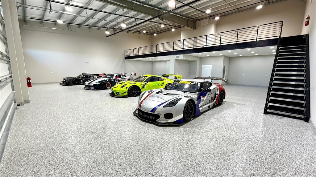 8185 Apex Way Sebring, FL 33876 - Photo 1 of 20 a car parked in parking room