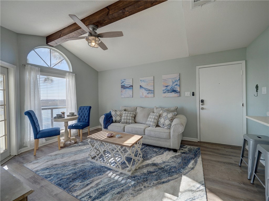14721 Whitecap Boulevard, Unit 337 Corpus Christi, TX 78418 - Photo 2 of 28 Living area with beautiful Coastal decor.