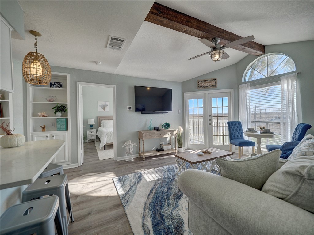 14721 Whitecap Boulevard, Unit 337 Corpus Christi, TX 78418 - Photo 6 of 28 Living room into bedroom.