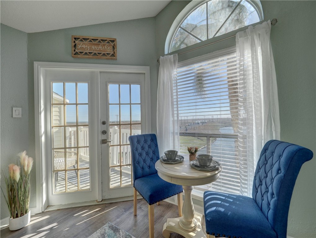 14721 Whitecap Boulevard, Unit 337 Corpus Christi, TX 78418 - Photo 7 of 28 Patio with a view of the pond and Gulf of America.