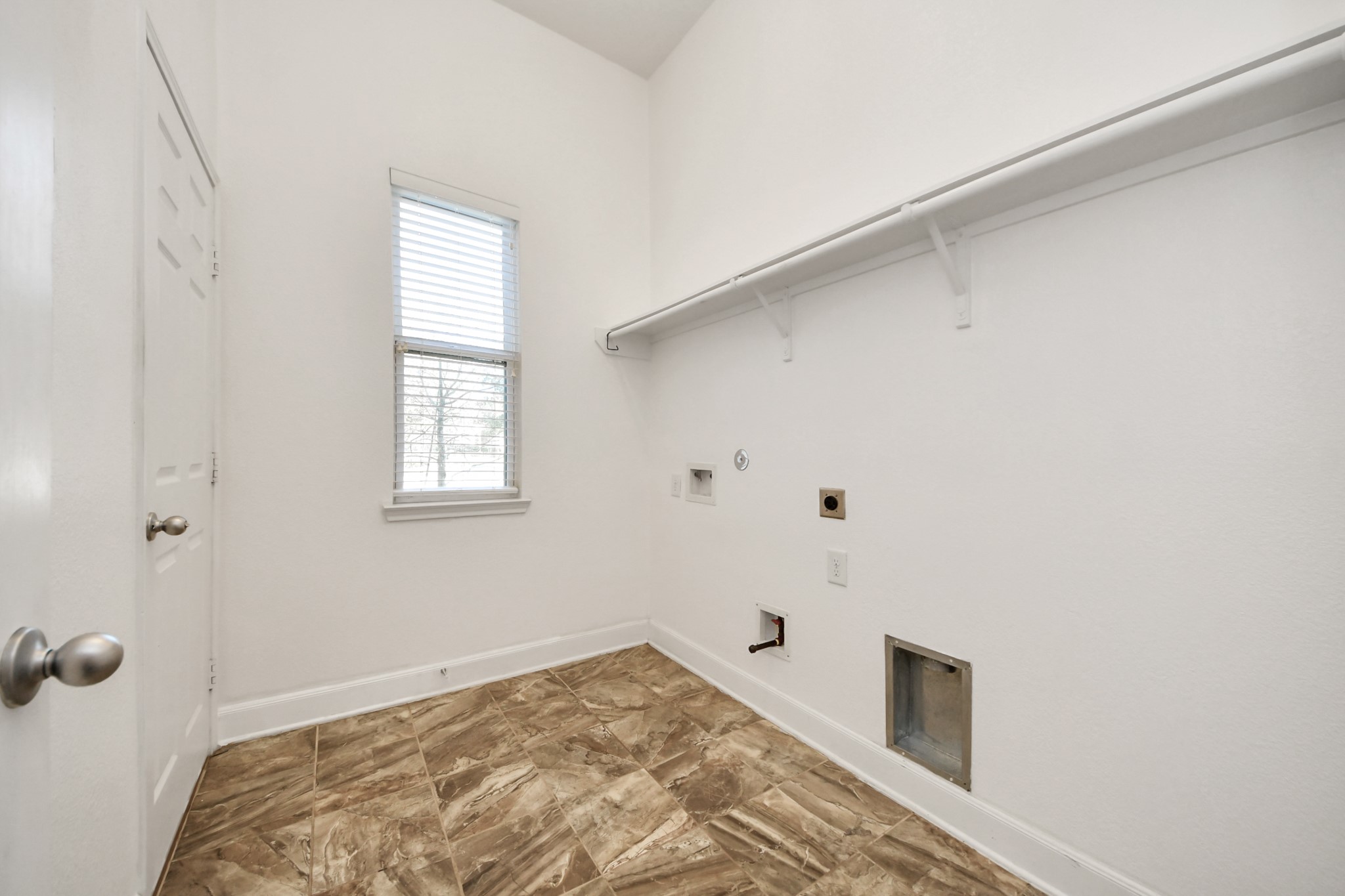 1947 Parnevik Place Conroe, TX 77304 - Photo 21 of 37 Laundry Room