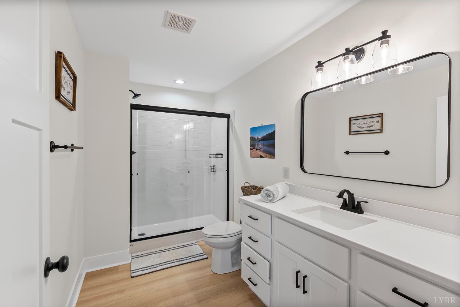 556 Leesville Road, Unit 1001 Lynchburg, VA 24502 - Photo 16 of 22 a spacious bathroom with a shower sink and toilet