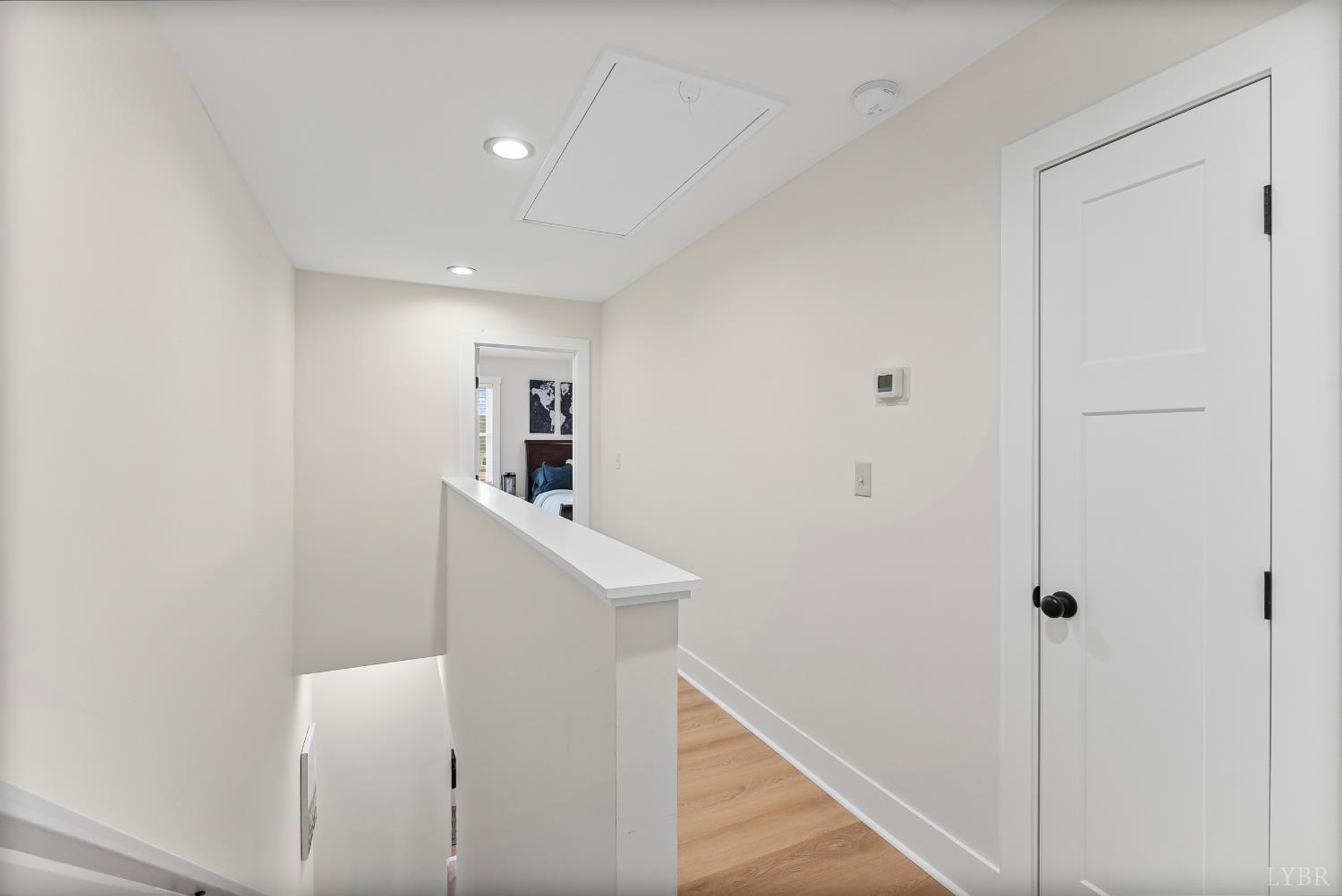 556 Leesville Road, Unit 1001 Lynchburg, VA 24502 - Photo 17 of 22 a view of a hallway with white cabinets