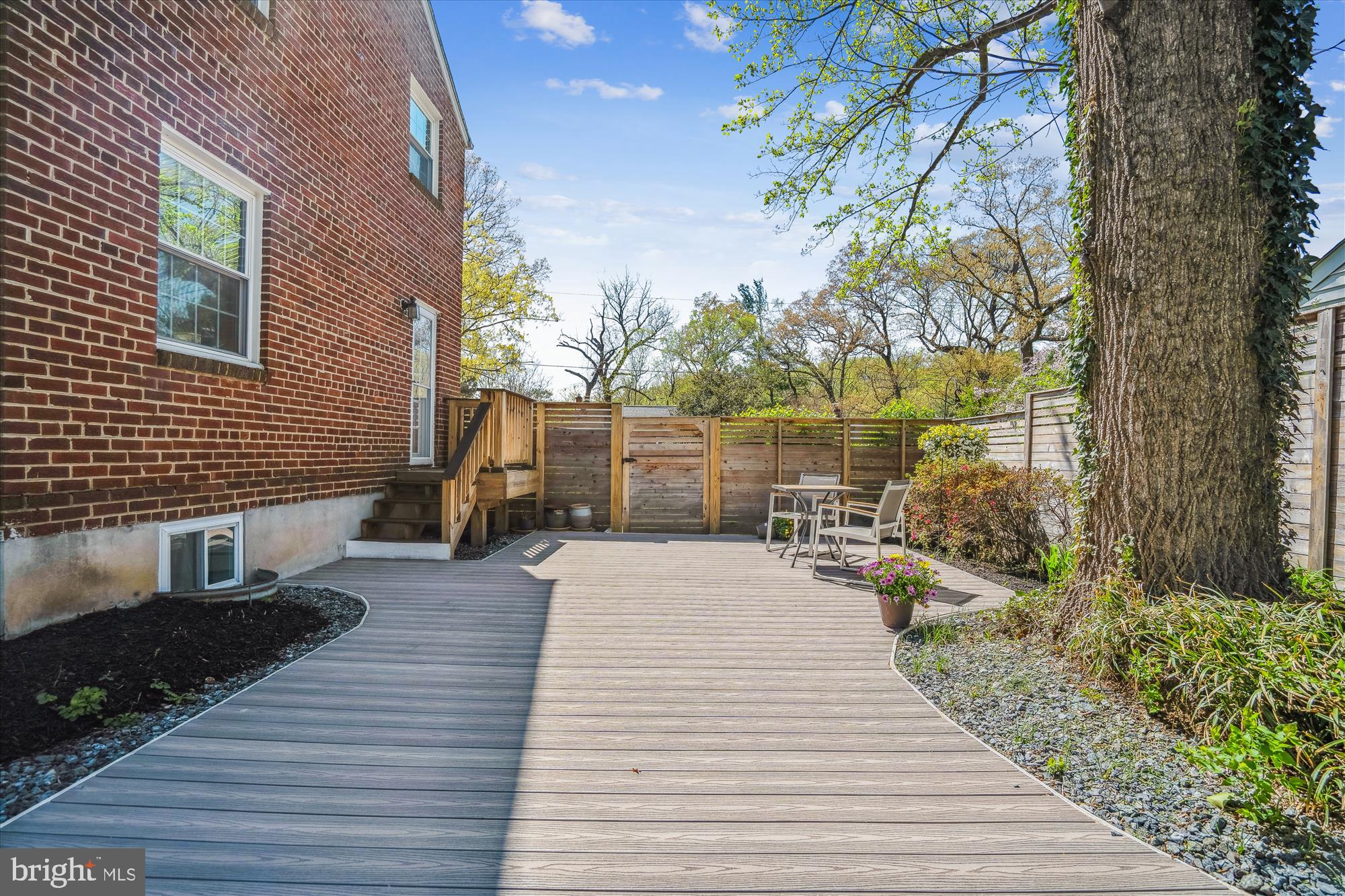 10115 Tenbrook Drive Silver Spring, MD 20901 - Photo 31 of 53 a view of a brick building next to a yard