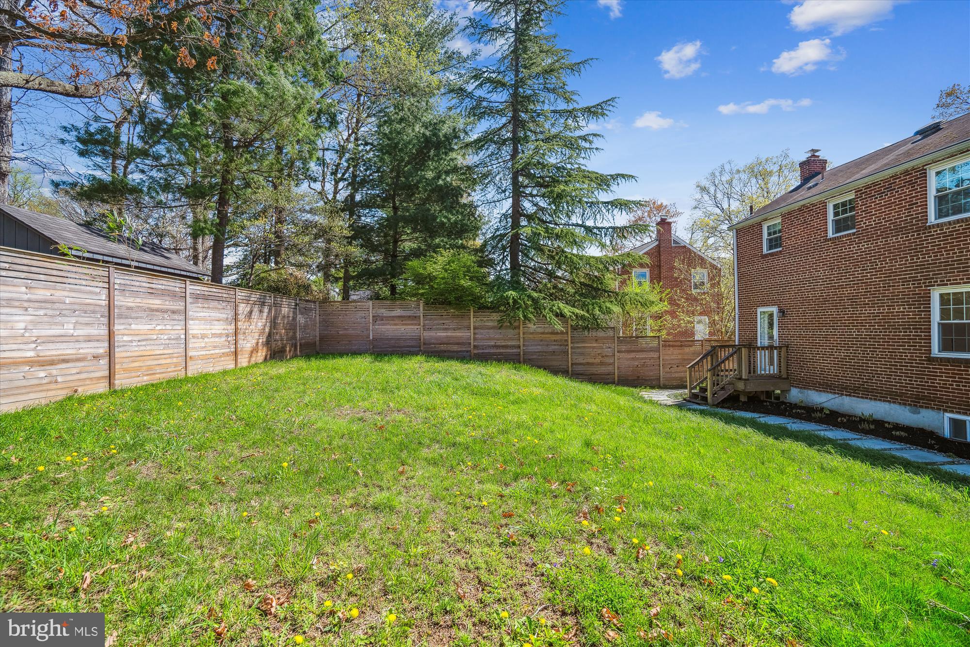 10115 Tenbrook Drive Silver Spring, MD 20901 - Photo 33 of 53 a view of a backyard with a garden