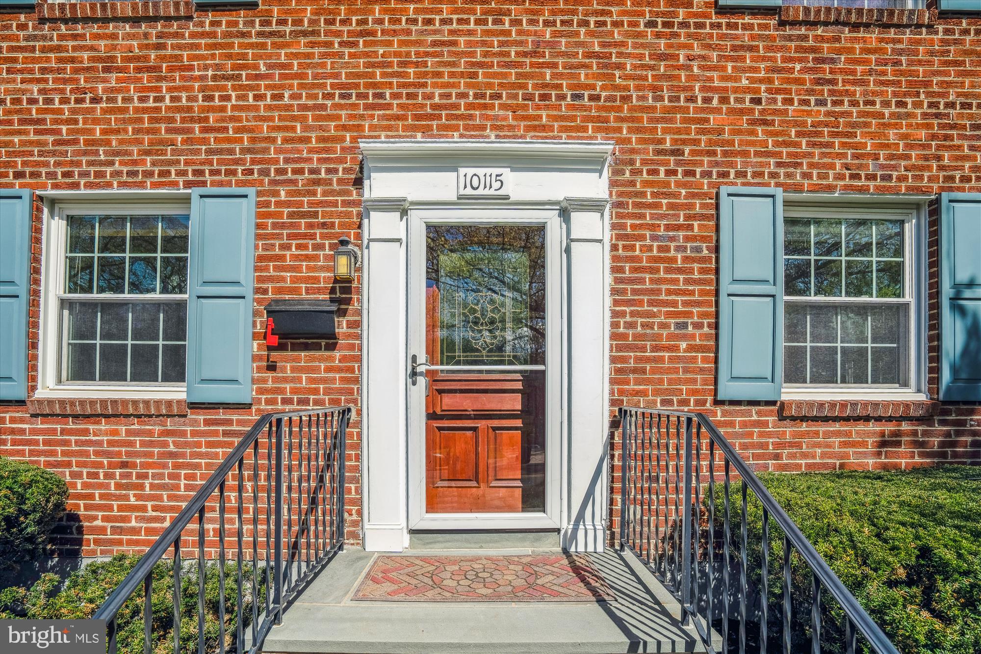 10115 Tenbrook Drive Silver Spring, MD 20901 - Photo 4 of 53 a view of a brick house with large windows