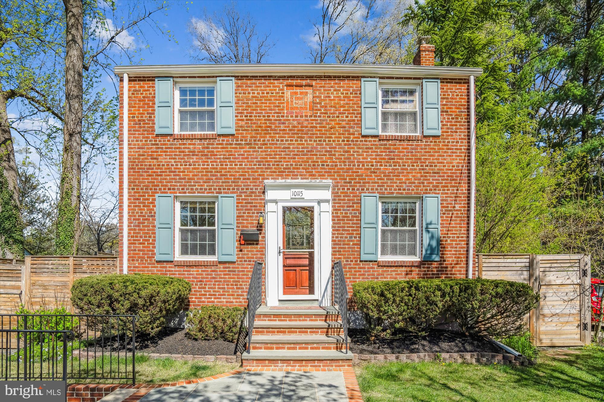 10115 Tenbrook Drive Silver Spring, MD 20901 - Photo 7 of 53 front view of a house with a yard
