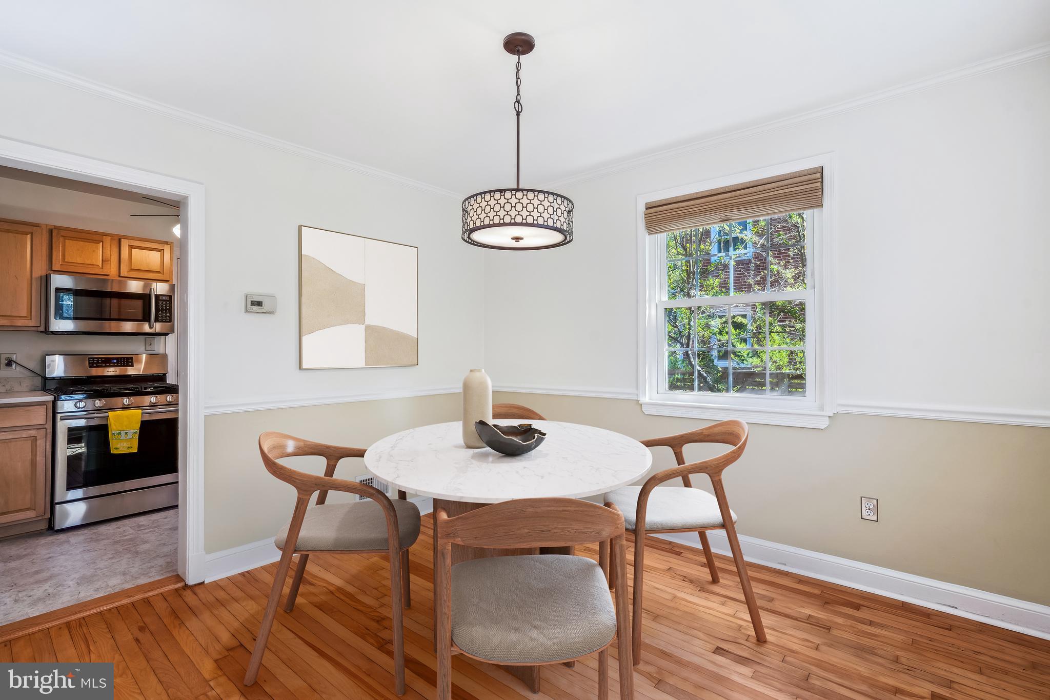10115 Tenbrook Drive Silver Spring, MD 20901 - Photo 8 of 53 a dining room with furniture and window