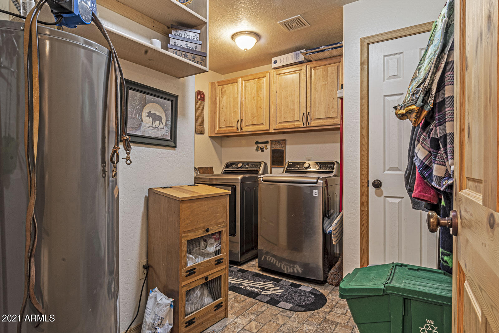 1057 Casper Lane Show Low, AZ 85901 - Photo 13 of 37 Laundry room off of the kitchen
