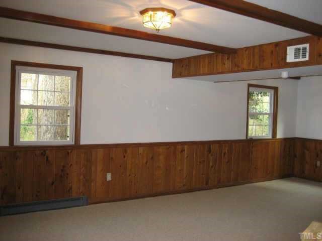 1427 Seminole Trail Raleigh, NC 27609 - Photo 7 of 8 a view of an empty room and window