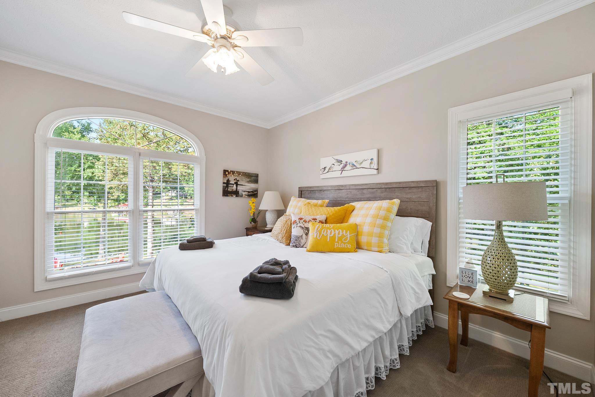 339 Velvet Road Semora, NC 27343 - Photo 19 of 68 a bedroom with a bed and a large window