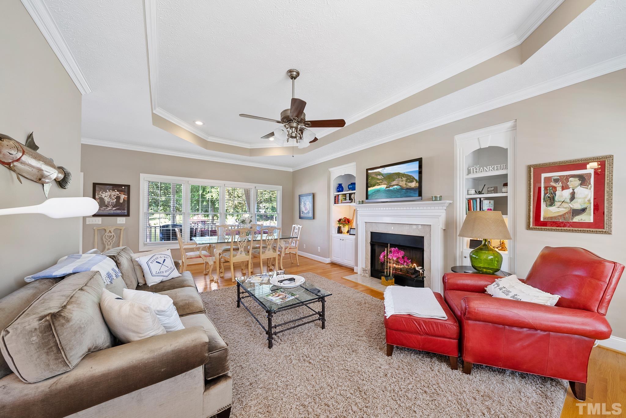339 Velvet Road Semora, NC 27343 - Photo 2 of 68 a living room with furniture fireplace and a large window