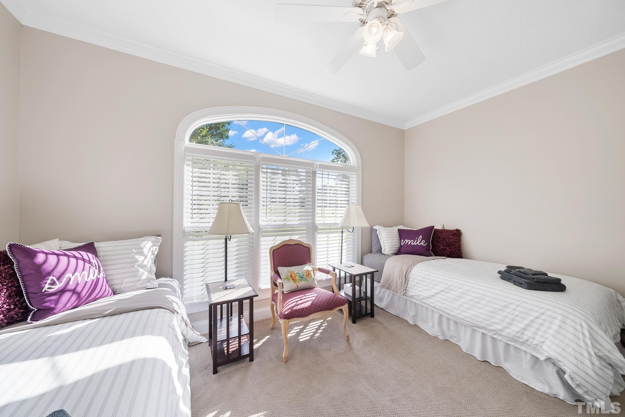 339 Velvet Road Semora, NC 27343 - Photo 23 of 68 a bedroom with a bed and a large window