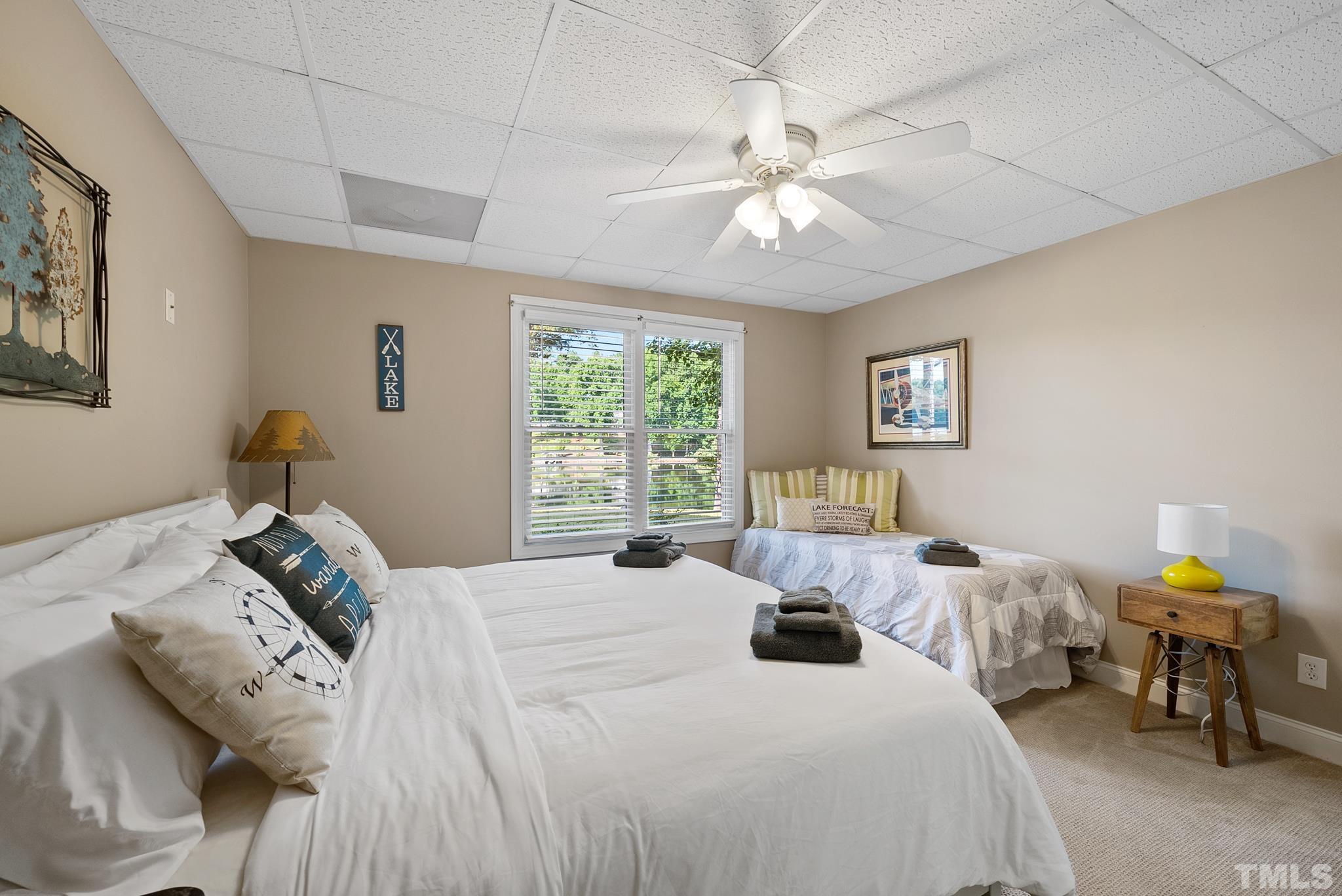 339 Velvet Road Semora, NC 27343 - Photo 39 of 68 a bedroom with bed and window