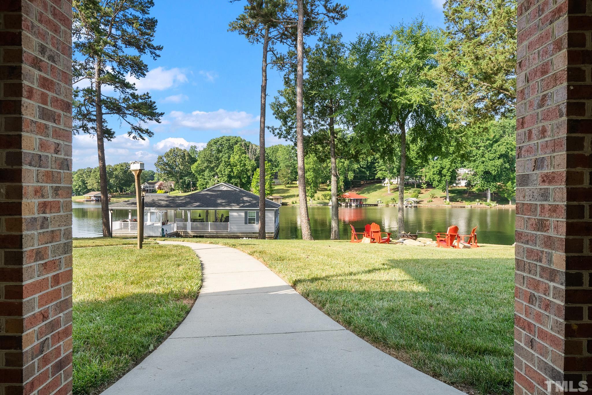 339 Velvet Road Semora, NC 27343 - Photo 50 of 68 a view of a backyard with a garden and plants