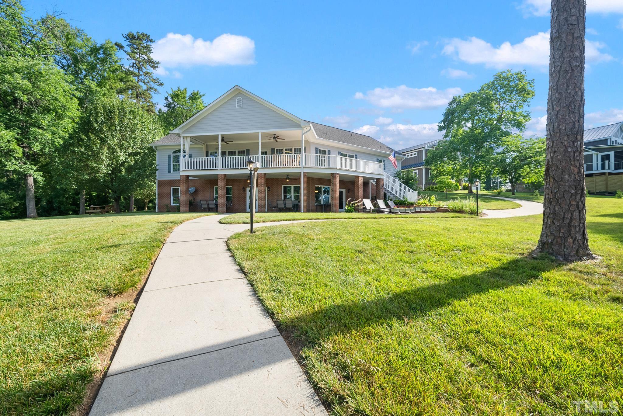 339 Velvet Road Semora, NC 27343 - Photo 53 of 68 a front view of a house with a yard