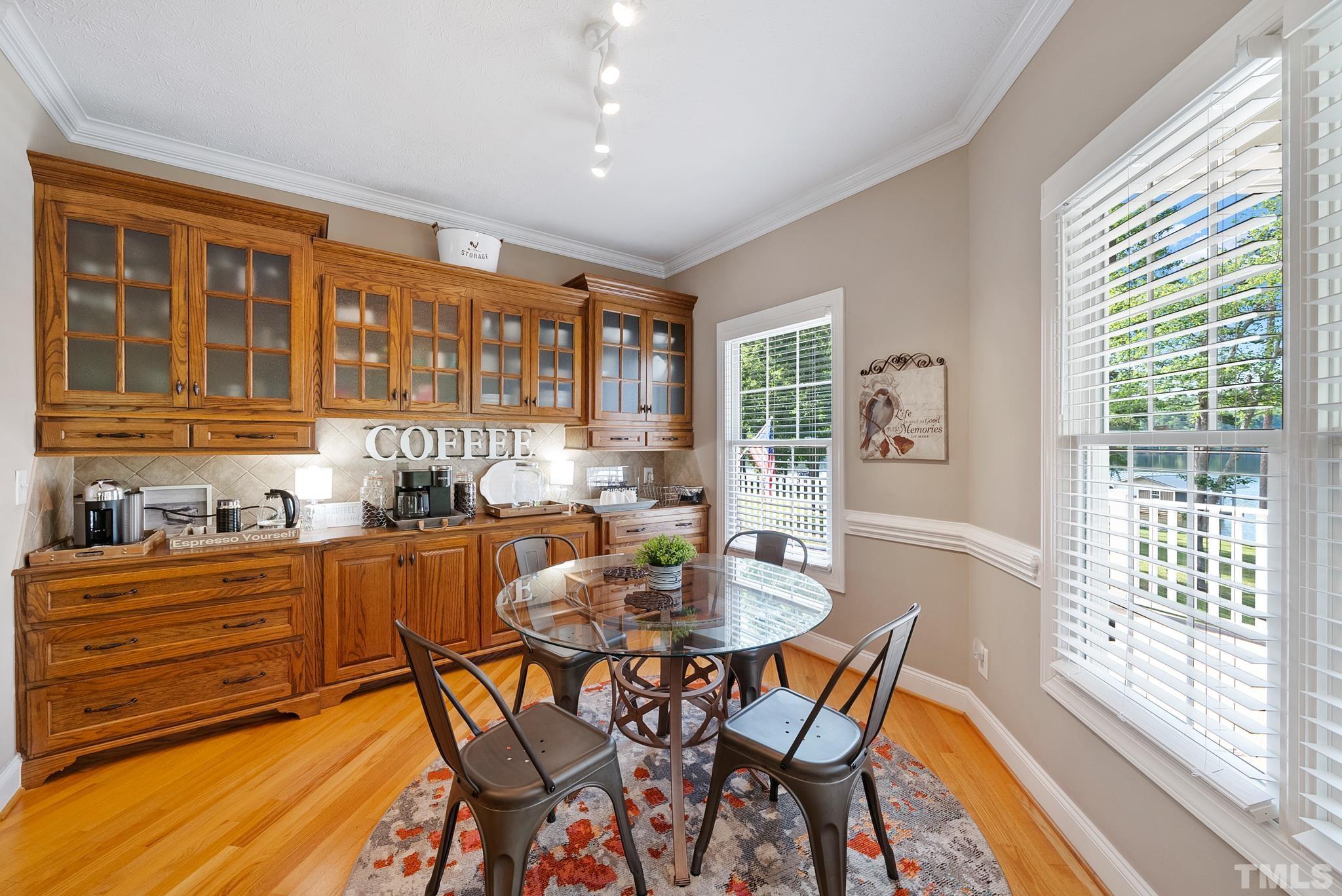 339 Velvet Road Semora, NC 27343 - Photo 61 of 68 a dining room with furniture a rug and wooden floor
