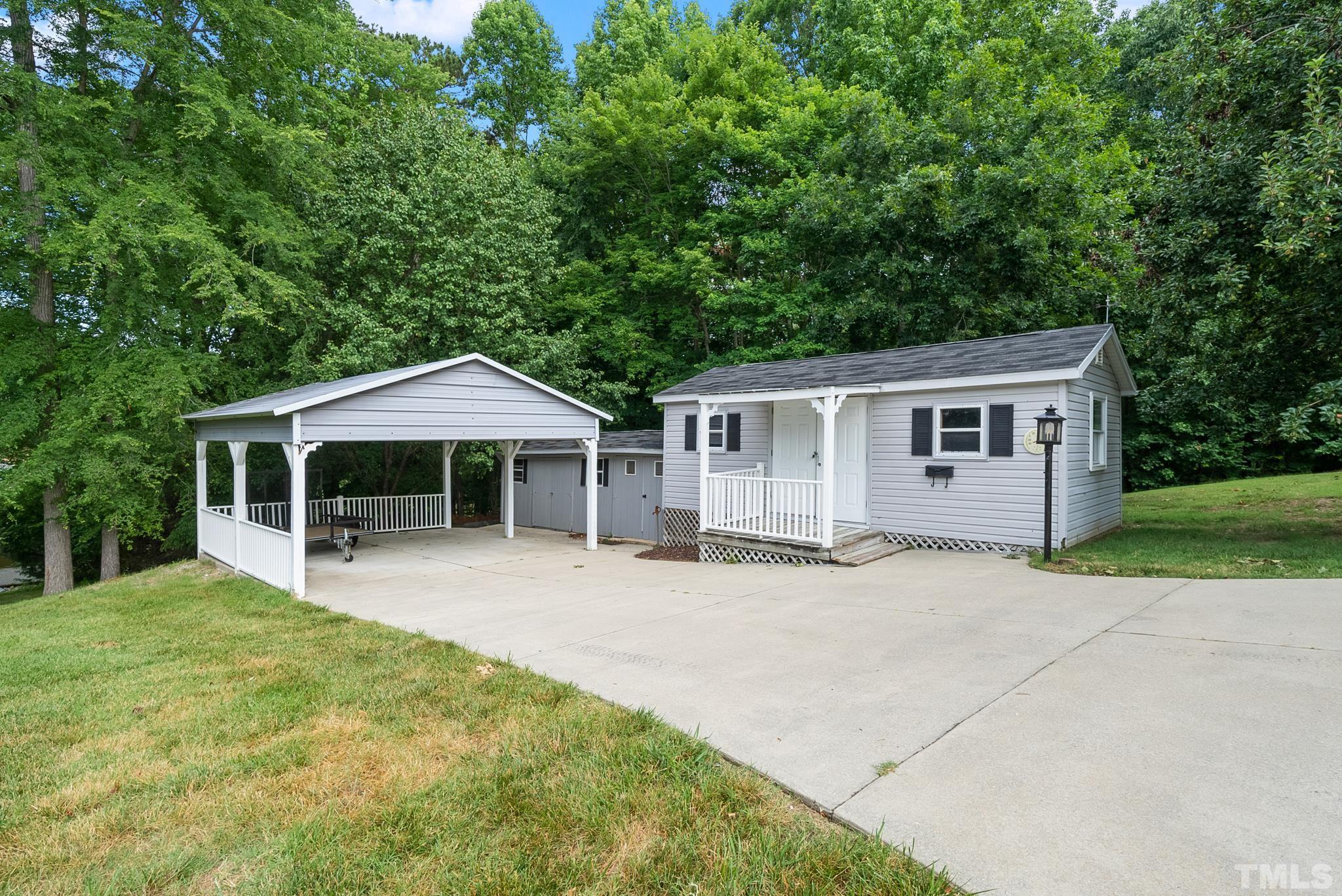 339 Velvet Road Semora, NC 27343 - Photo 68 of 68 a front view of a house with yard patio and green space