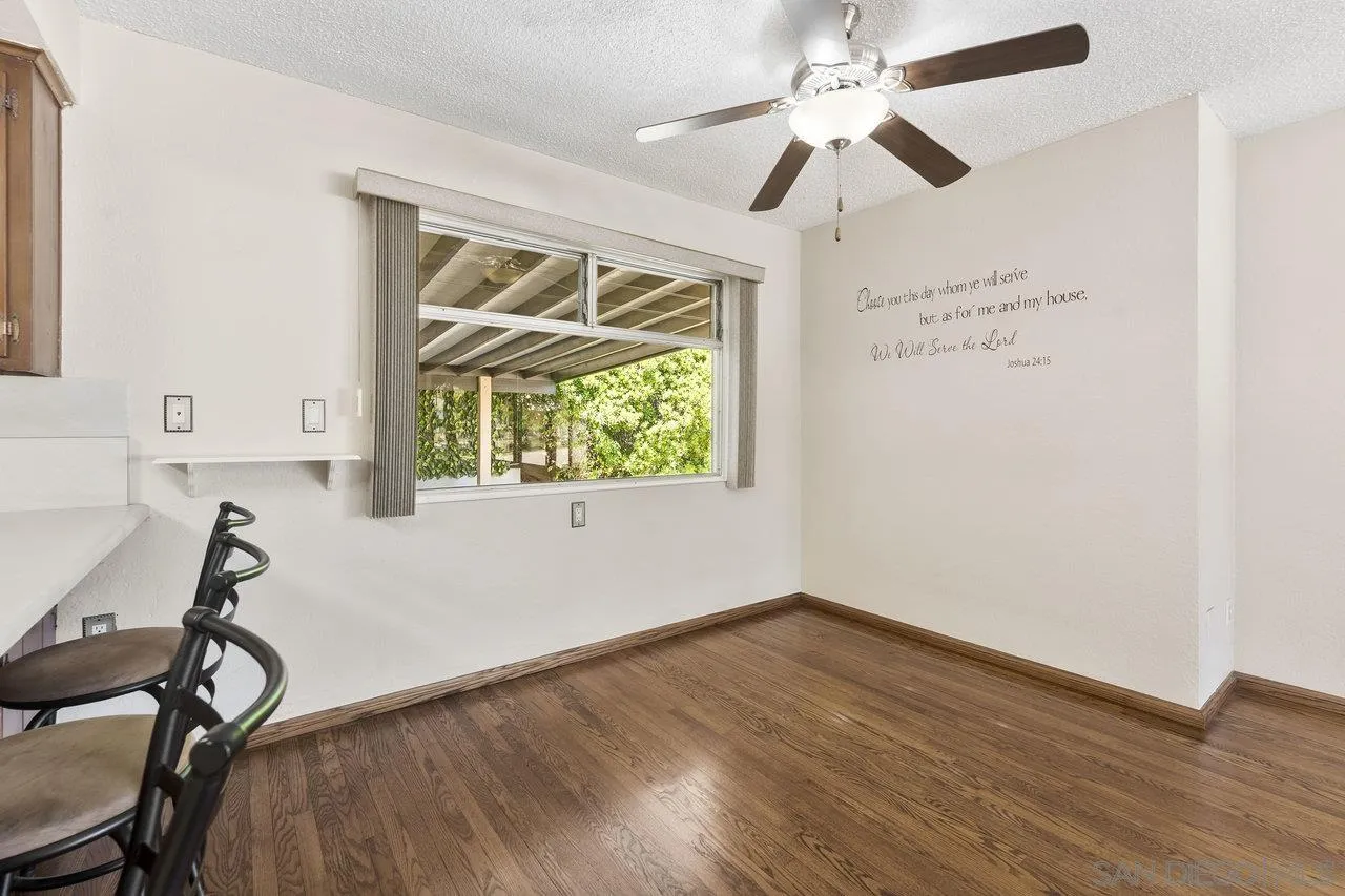 1822 Wight Way El Cajon, CA 92021 - Photo 11 of 45 a view of room with hardwood floor and ceiling fan