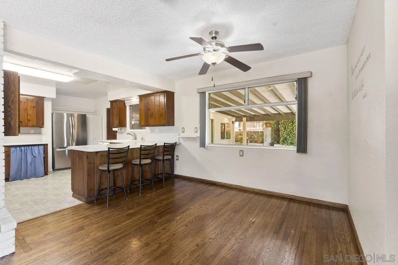 1822 Wight Way El Cajon, CA 92021 - Photo 12 of 45 a view of a livingroom with furniture wooden floor and window