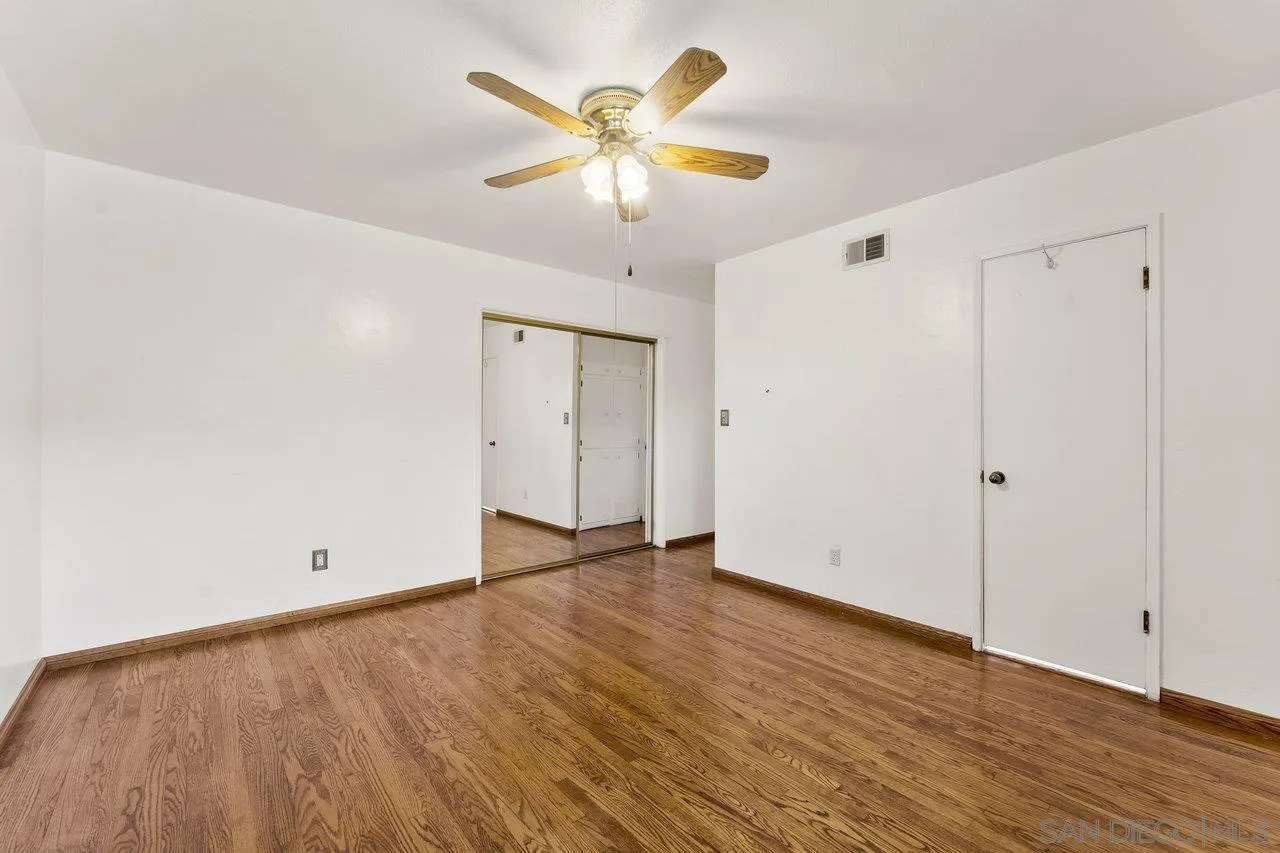 1822 Wight Way El Cajon, CA 92021 - Photo 25 of 45 a view of an empty room with wooden floor