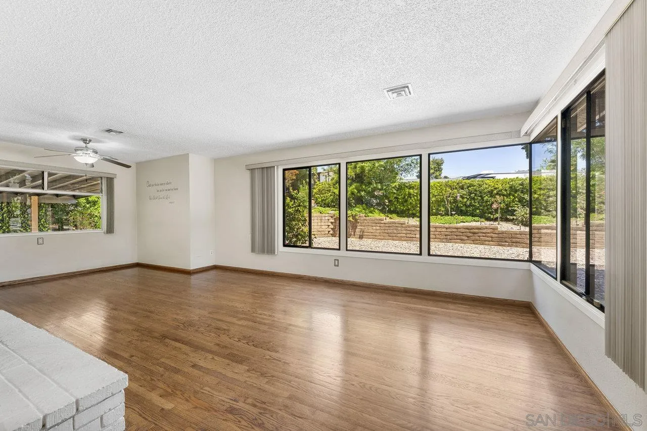 1822 Wight Way El Cajon, CA 92021 - Photo 7 of 45 wooden floor in an empty room with a window