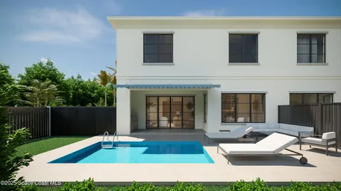 a view of a house with backyard