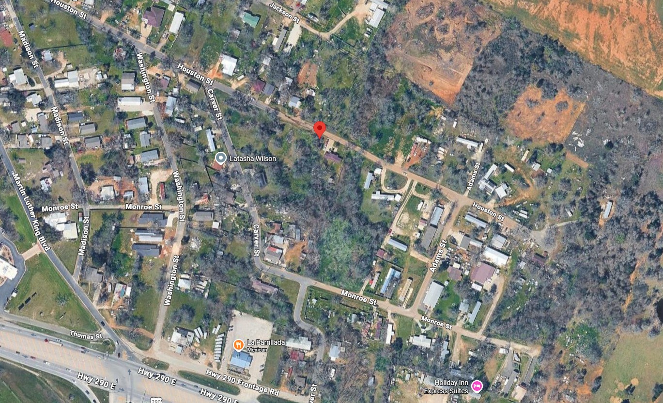 327 Houston Street Elgin, TX 78621 - Photo 7 of 7 A prime building lot awaits, conveniently located near main thoroughfares and local amenities.