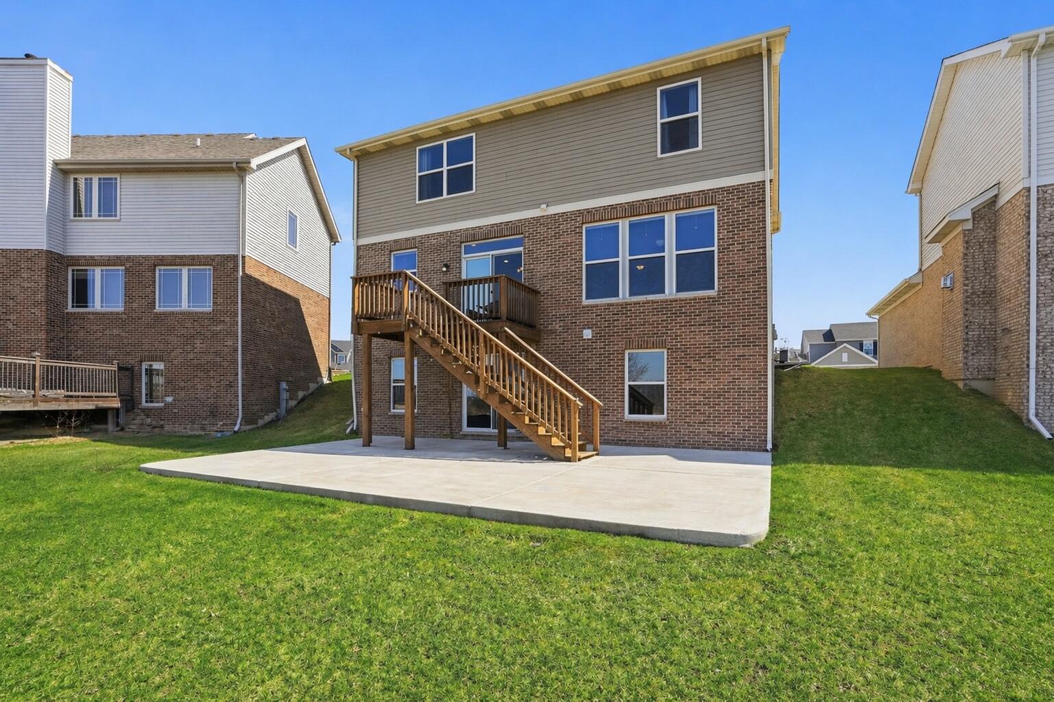 10322 Adler Cove St. John, IN 46373 - Photo 25 of 26 a view of a house with a yard